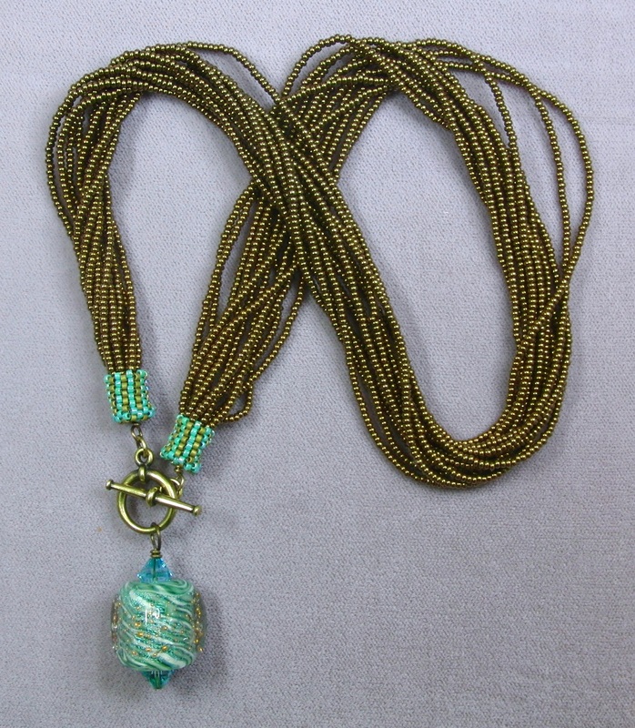 Multistrand Necklace with Unicorne Focal Bead